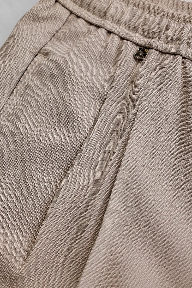 Beige Textured Relaxed Fit Trousers